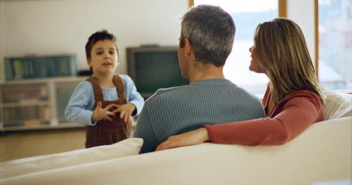 Boys talking. Talking to parents.